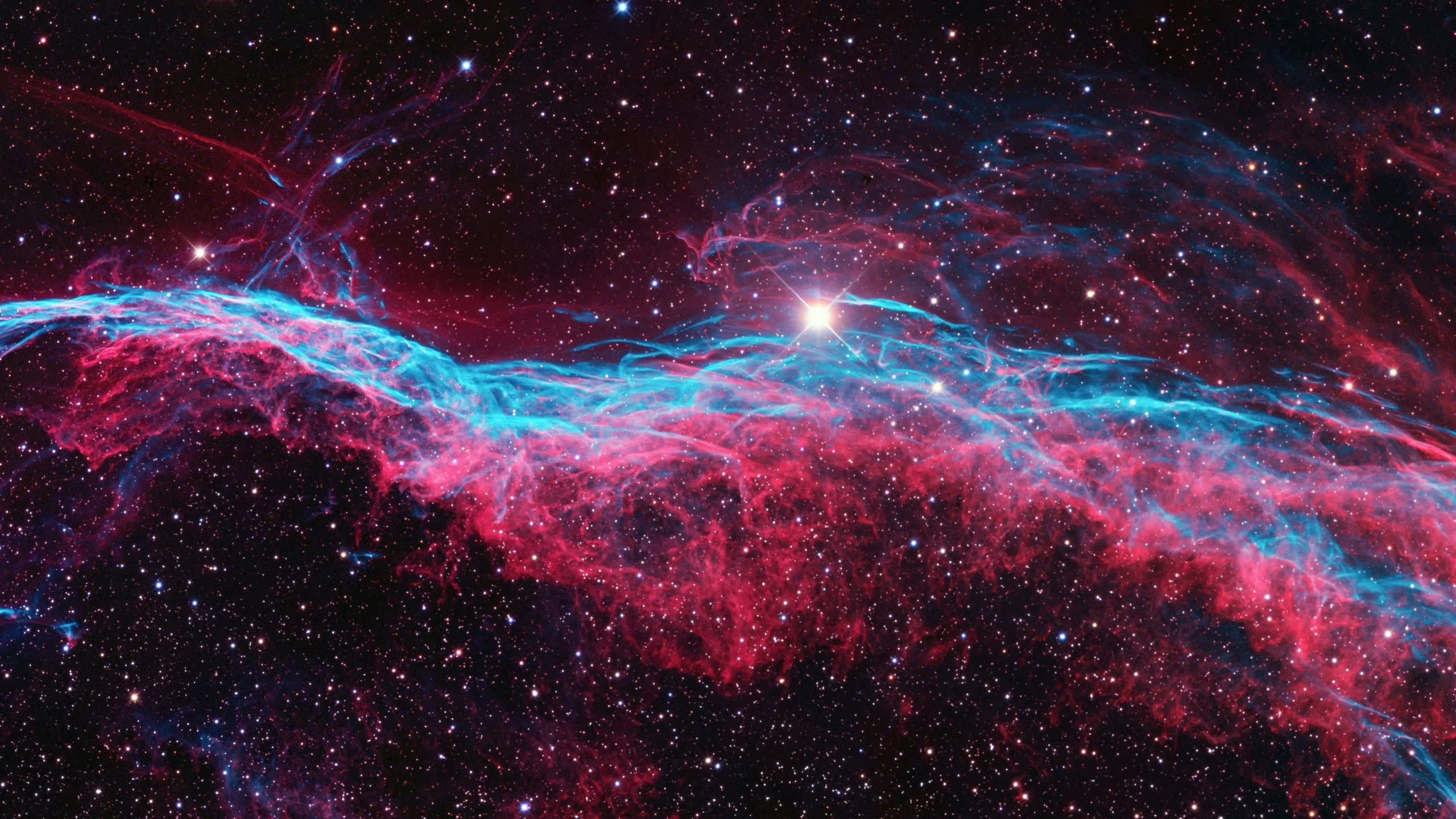 خلاء میں گلابی نیبولا 2560x1440 وال پیپر