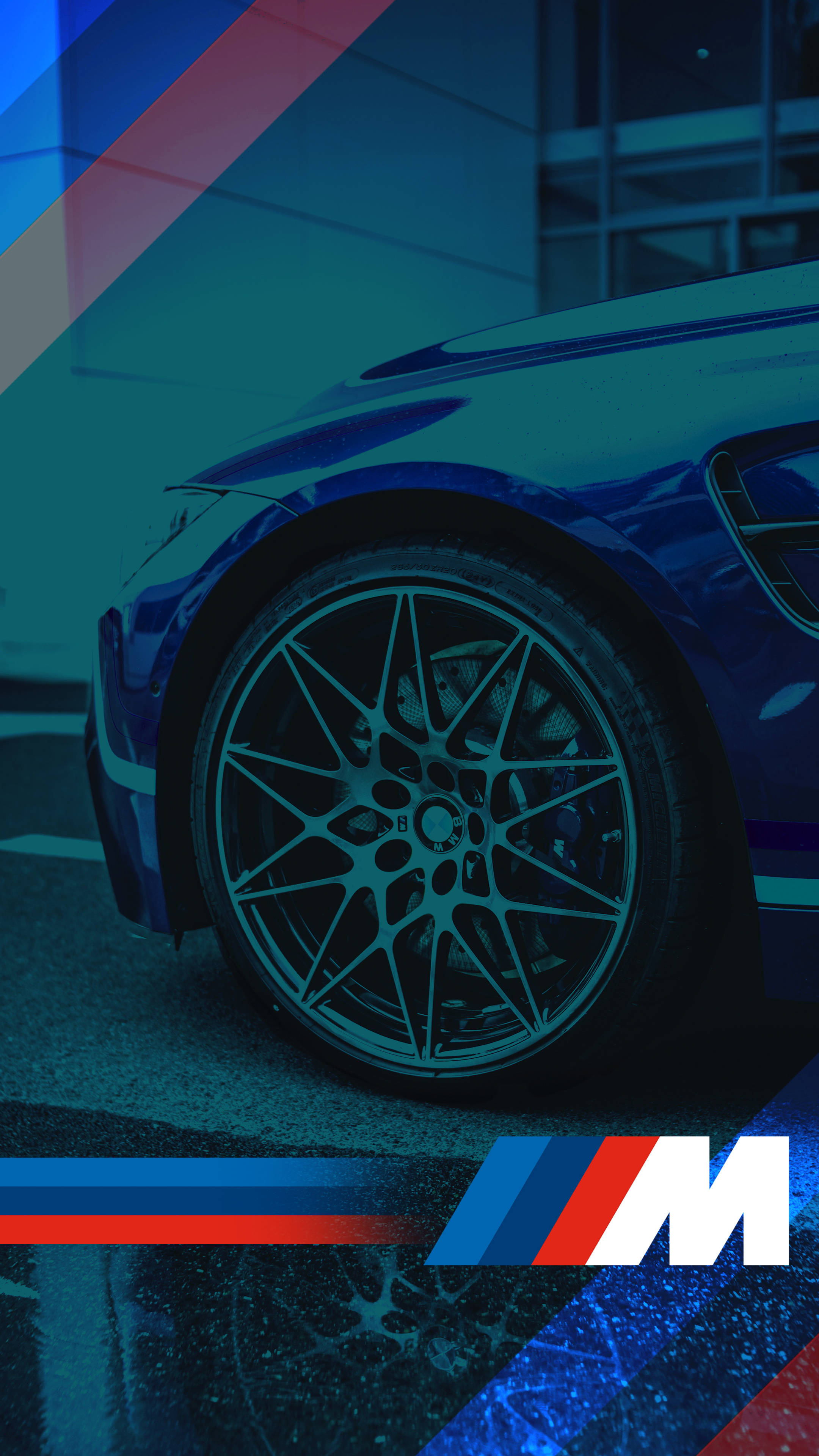 نیلی کار کا ٹائر اور BMW M لوگو وال پیپر