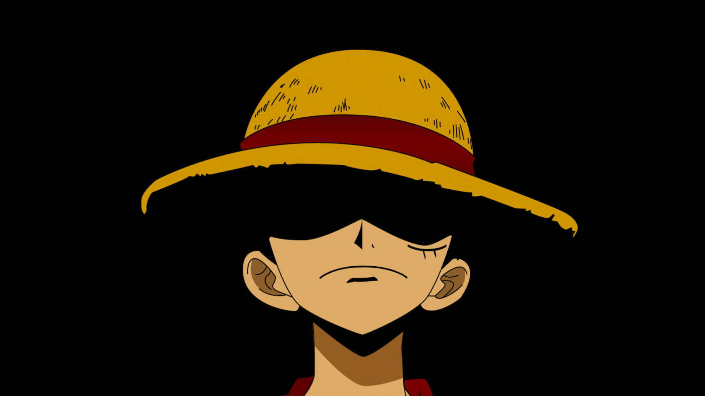 Luffy کا سیاہ بیک ڈراپ جس میں مشہور اسٹرا ہیٹ ہے وال پیپر
