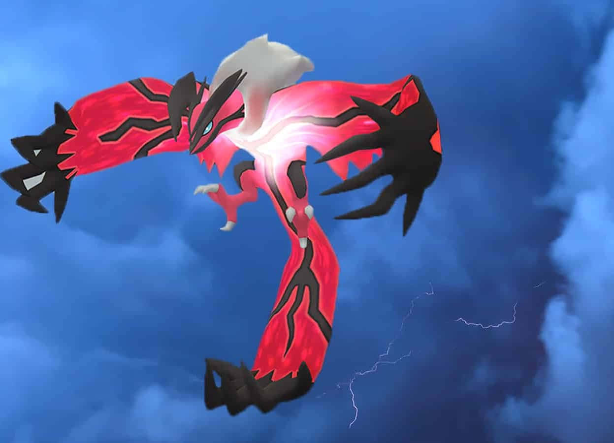 آسمان میں چمکتا ہوا Yveltal Pokemon وال پیپر