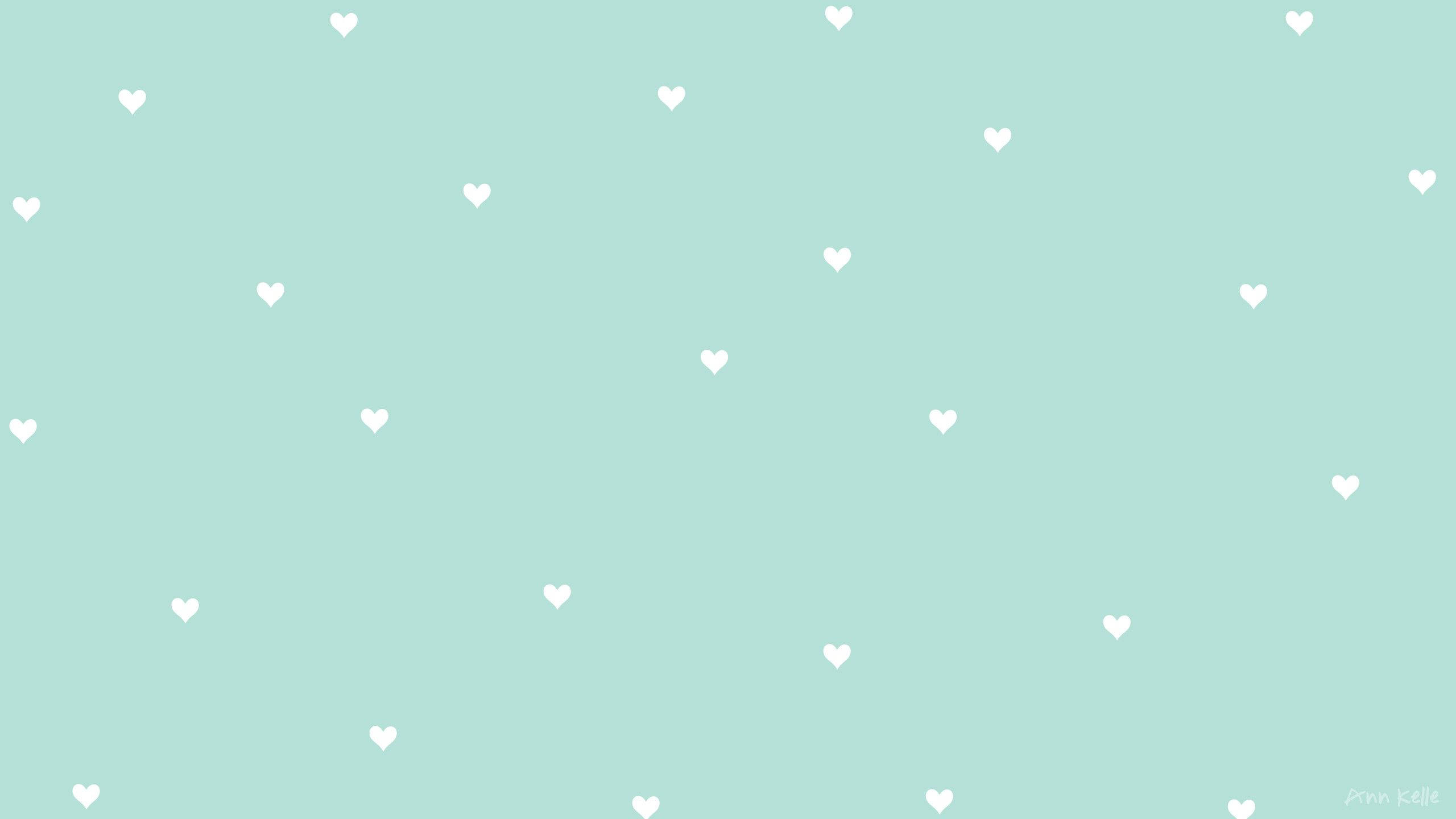 پیسٹل سبز پر چھوٹے چھوٹے دل وال پیپر